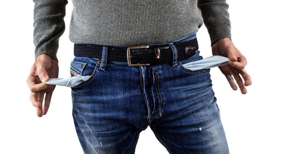 Man-empty-pockets-jeans-debt-money-bankrupt. by  Darko Djurin