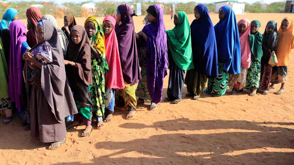 Internally displaced girls in Somalia queue before at a school beside an IDP camp in Dollow, Somalia April 4, 2017. REUTERS/Zohra Bensemra