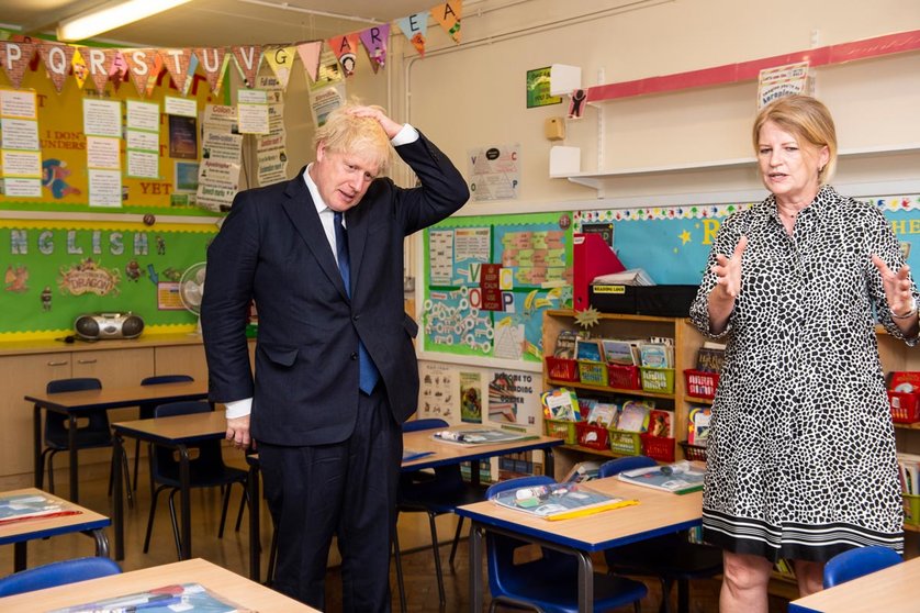 10 August 2020, England, London: Head teacher Bernadette Matthews (R) shows UK Prime Minister Boris Johnson the new measures being implemented to ensure children can return to school safely in September during his visit to St Joseph&#39;s Catholic Primary School. Photo: Lucy Young/dpa.