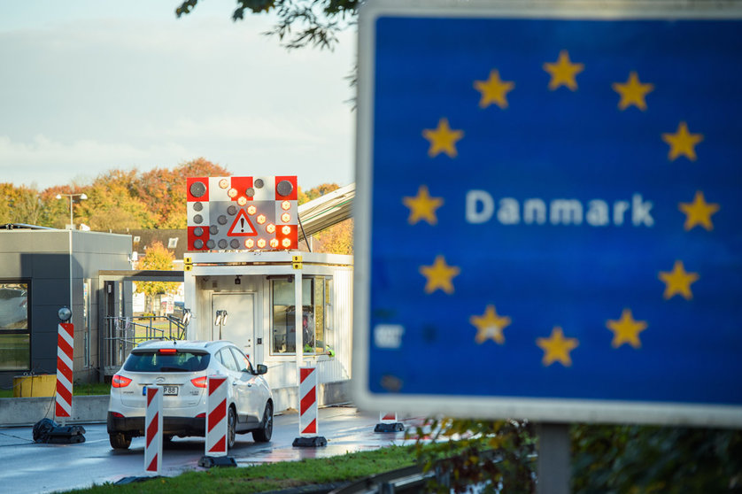 24 October 2020, Schleswig-Holstein, Flensburg: Vehicles drive past the borders near Flensburg from Germany into Denmark. As of Saturday entry from Germany has been subjected to restrictions after Denmark declared Germany as a risk country amid the rising numbers of coronavirus infections. Photo: Gregor Fischer/dpa.