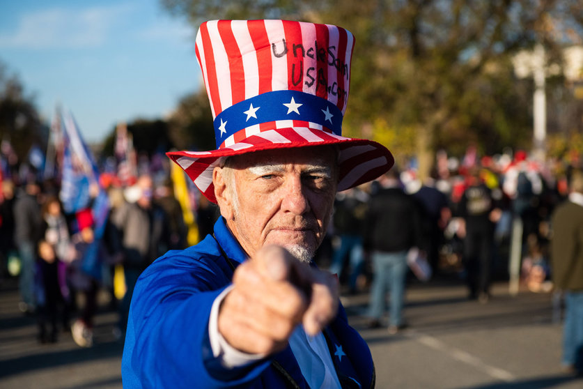 14 November 2020, US, Washington: A supporter of the US President Donald Trump dressed as Uncle Sam takes part in the &#39;Million Maga March&#39; protest against the results of the 2020 presidential election. Photo: -/Imagespace/dpa.