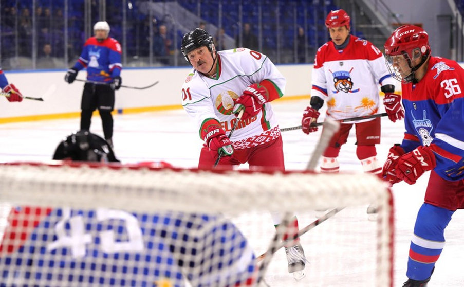 FILED - Belarus President Alexander Lukashenko (centre) participates in an ice hockey match with Russian President Vladimir Putin (not pictured) at Shaiba Arena in February 2019. Belarus was on Monday removed as co-host of this year's ice hockey world championships by the ruling body IIHF after big pressure from politicians and sponsors. Photo: -/Kremlin/dpa
