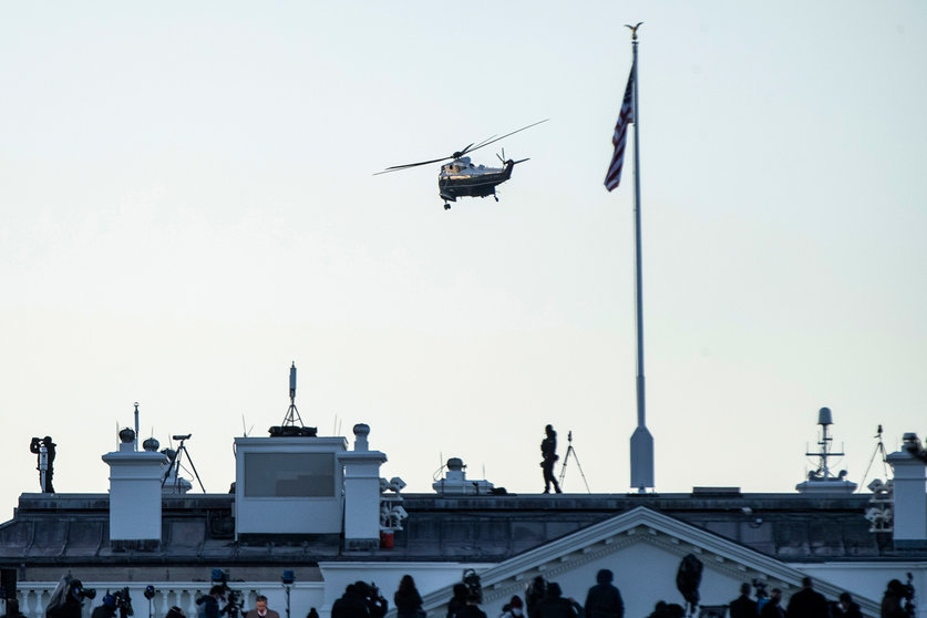 20 January 2021, US, Washington: Marine One carrying US President Donald Trump takes off from the White House as he leaves ahead of the inauguration of President-elect Joe Biden. Photo: Chris Juhn/ZUMA Wire/dpa