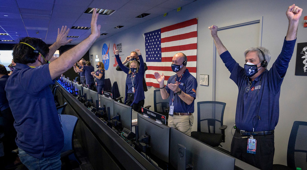 18 February 2021, US, Pasadena: Members of the NASA Perseverance Mars rover mission team cheer as the spacecraft successfully land on Mars, at the NASA Jet Propulsion Laboratory in Pasadena. NASA's Mars rover Perseverance landed on the Red Planet on Thursday after a roughly 480-million-kilometre journey through space, the first probe from Earth to reach Mars since 2018. Photo: Bill Ingalls/Nasa/Planet Pix via ZUMA Wire/dpa