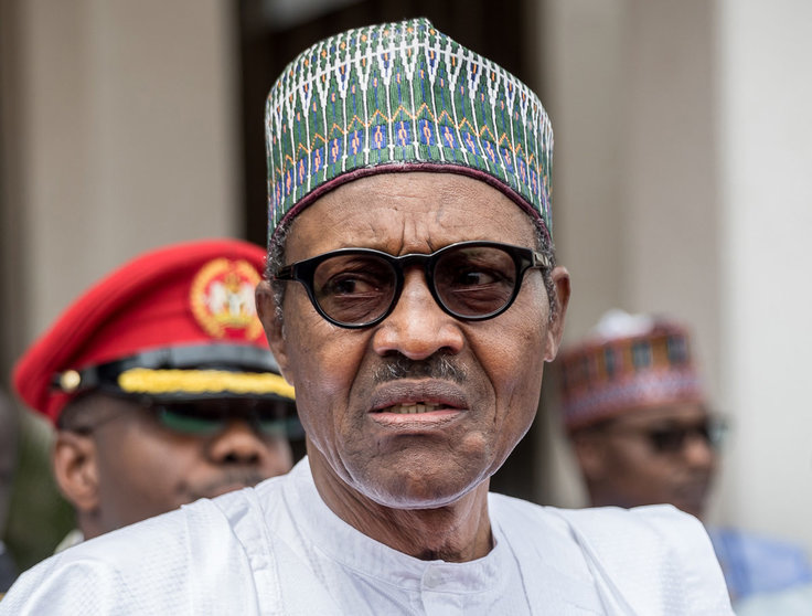 FILED - 31 August 2018, Nigeria, Abuja: Nigerian President Muhammadu Buhari stands in front of State House. Buhari said a state-wide ban on Twitter which prompted international condemnation over the weekend was only a temporary measure in response to misinformation, in comments posted on Facebook. Photo: Michael Kappeler/dpa