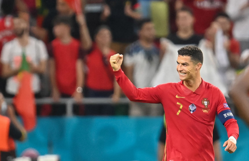 23 June 2021, Hungary, Budapest: Portugal's Cristiano Ronaldo celebrates scoring his side's first goal during the UEFA EURO 2020 Group F soccer match between Portugal and France at the Puskas Arena. Photo: Robert Michael/dpa-Zentralbild/dpa.