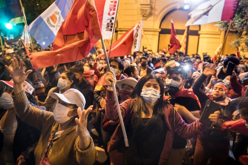 26 June 2021, Peru, Lima: Supporters of the left-wing presidential candidate Castillo take part in a demonstration. Photo: Adrian Portugal/dpa