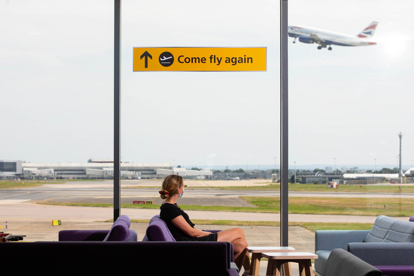 29 July 2021, United Kingdom, London: A general view of "Come Fly Again" signage at London's Heathrow Airport during a celebration for the safe reopening of international travel and its 75th anniversary. Photo: David Parry/PA Wire/dpa