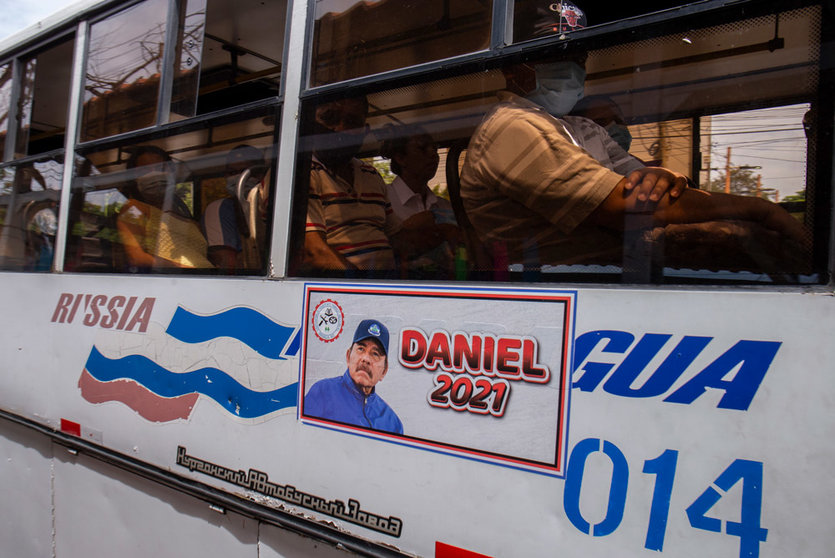 FILED - "Daniel 2021," reads next to a picture of Nicaraguan President Daniel Ortega on a public transportation bus. Five candidates for the presidential candidacy from opposition alliances were arrested within a few weeks. Photo: -/dpa.