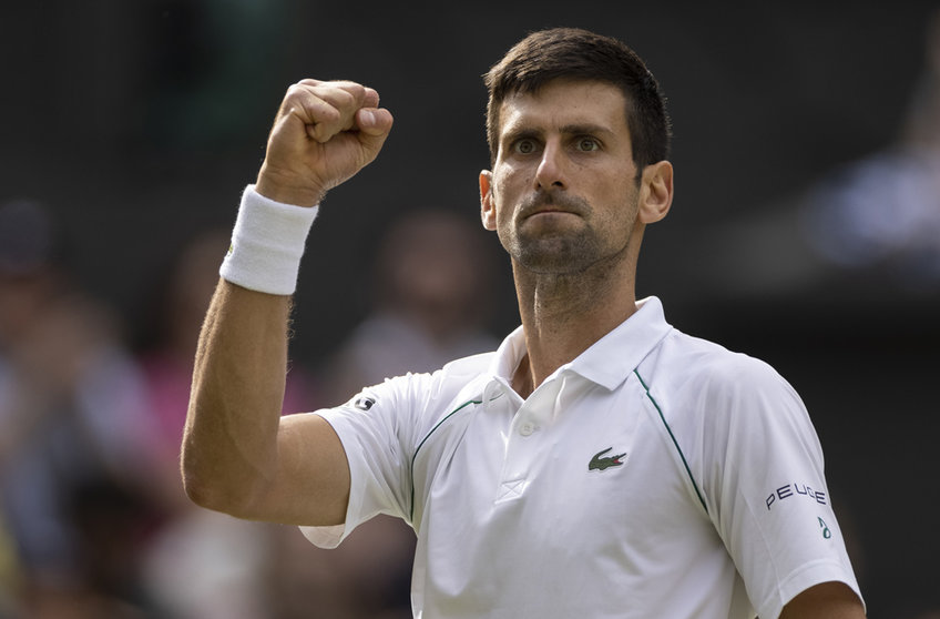 FILED - 11 July 2021, United Kingdom, London: Serbian tennis player Novak Djokovic reacts during his Men's Final tennis match against Italy's Matteo Berrettini during Wimbledon Tennis tournament. Djokovic won a legal victory in his bid to avoid deportation from Australia and compete for a record 21st Grand Slam tennis title. Photo: Simon Bruty/Aeltc Pool/PA Wire/dpa.
