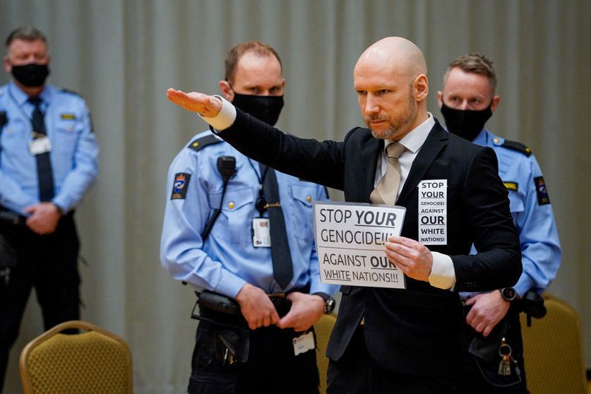 18 January 2022, Norway, Skien: Anders Behring Breivik (C), convicted of terrorism after killing 77 people in July 2011, arrives for the first day of trial in the temporary courtroom at Skien Prison, where his application for early release is being heard by the Telemark District Court. Photo: Ole Berg-Rusten/ntb/dpa.