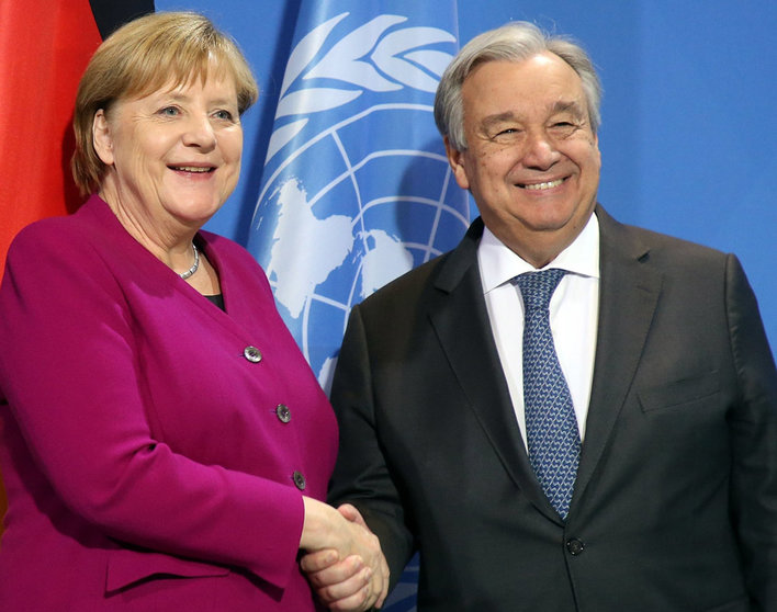 FILED - 26 November 2019, Berlin: Then German Chancellor Angela Merkel (L) and Secretary-General of the United Nations Antonio Guterres, shake hands after their statement at the Federal Chancellery. Former German chancellor Angela Merkel has rejected a job offer from UN Secretary General Antonio Guterres. Photo: Wolfgang Kumm/dpa.