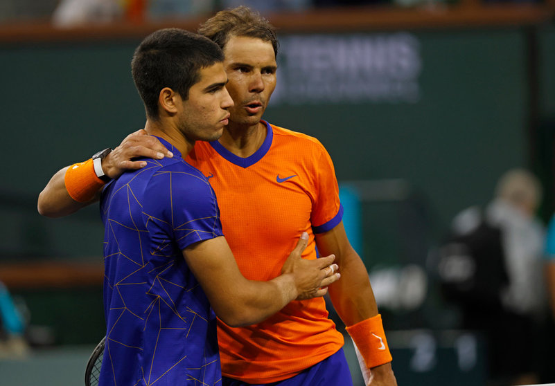 19 March 2022, US, Indian Wells: Spanish tennis player Rafael Nadal (R) is congratulated by Spain's Carlos Alcaraz after their Men's Singles Semi-final Tennis match of the Indian Wells Masters tennis tournament at Indian Wells Tennis Garden. Photo: Charles Baus/CSM via ZUMA Press Wire/dpa.