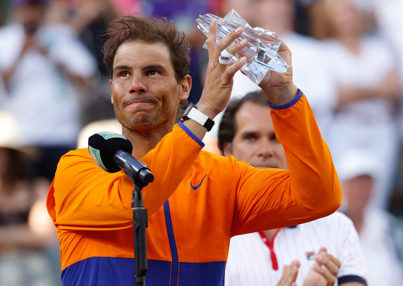 20 March 2022, US, Indian Wells: Spanish tennis player Rafael Nadal holds the runner-up trophy after the Men's Singles Final Tennis match against USA's Taylor Fritz during the Indian Wells Masters tennis tournament at Indian Wells Tennis Garden. Photo: Charles Baus/CSM via ZUMA Press Wire/dpa.