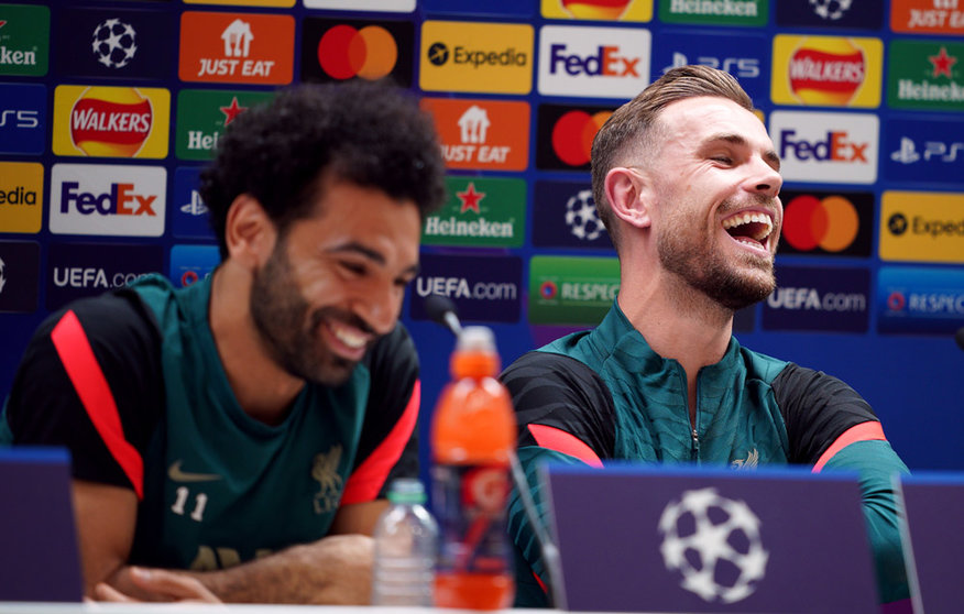 25 May 2022, United Kingdom, Liverpool: Liverpool's Mohamed Salah (L) and Jordan Henderson attend a press conference for the team at the AXA Training Centre, ahead of Saturday's UEFA Champions League Final match against Real Madrid. Photo: Peter Byrne/PA Wire/dpa.